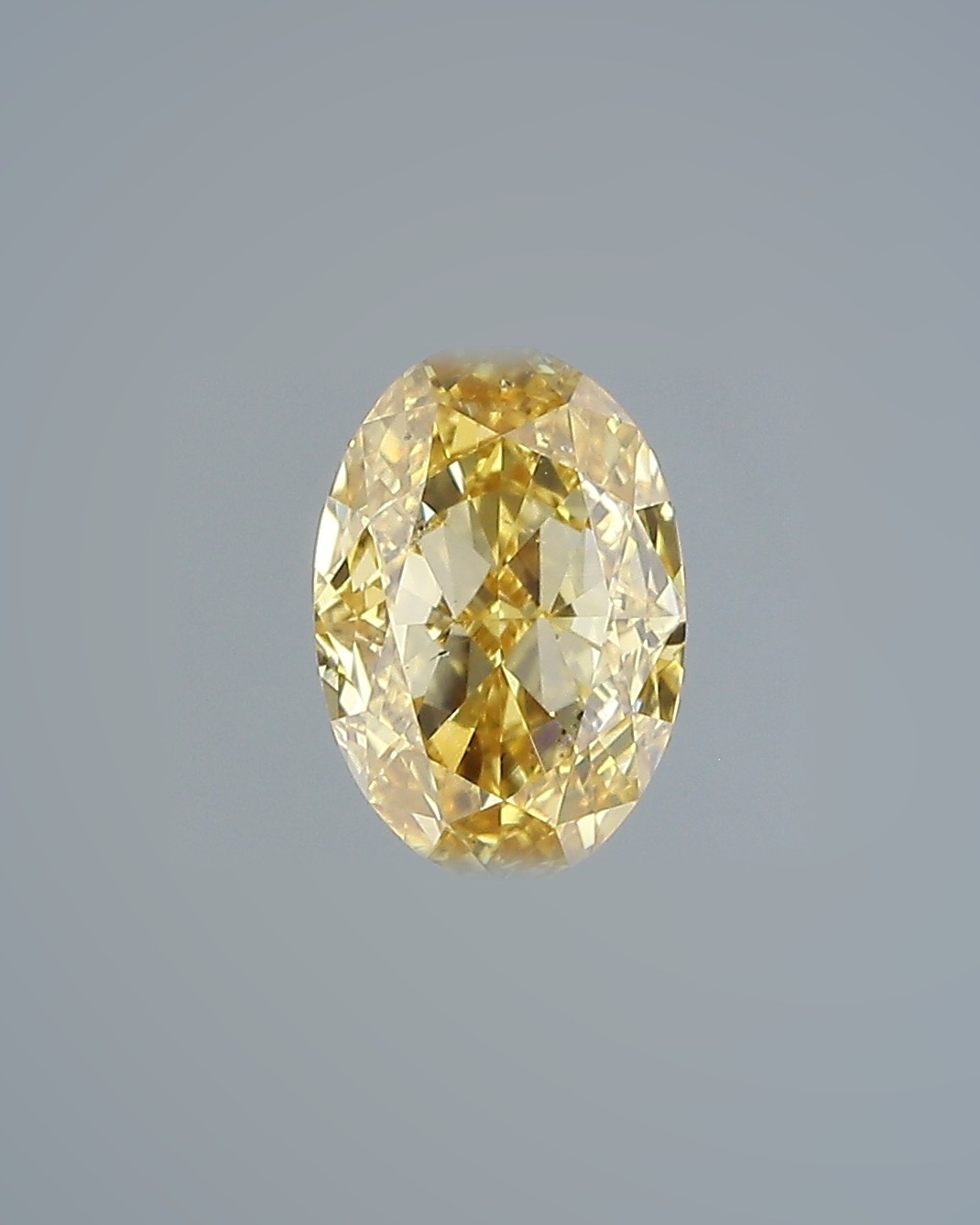 1.03 ct Oval Fancy Colour Diamond, SI1, Fancy Intense Orange-Yellow